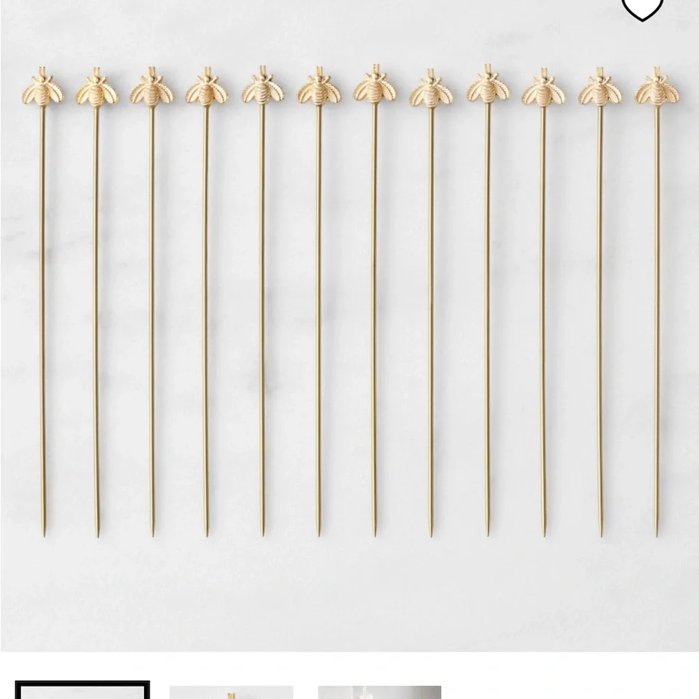 Williams Sonoma coupe glasses, cocktail picks, and holder